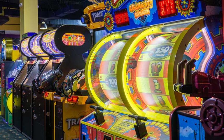 row of colorful arcade games at happys family fun center fort myers