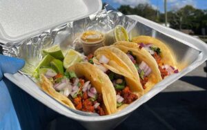 soft shell tacos with lime in styrofoam tray at nachos tacos tampa