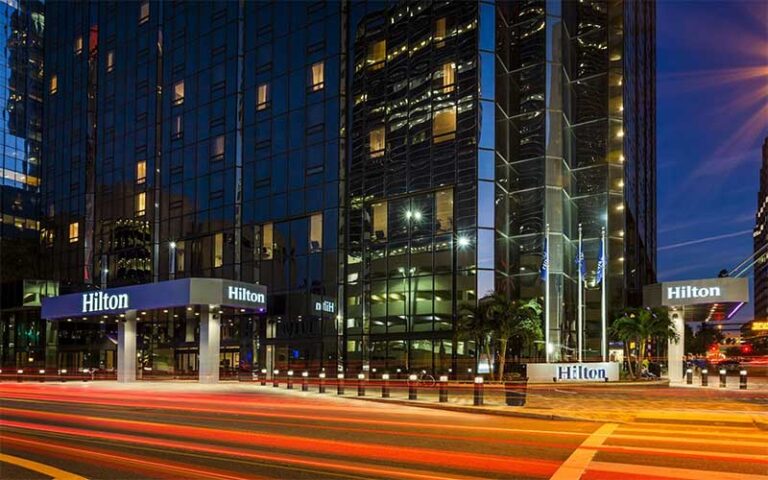 street level night exterior of base of high rise buildings at hilton tampa downtown