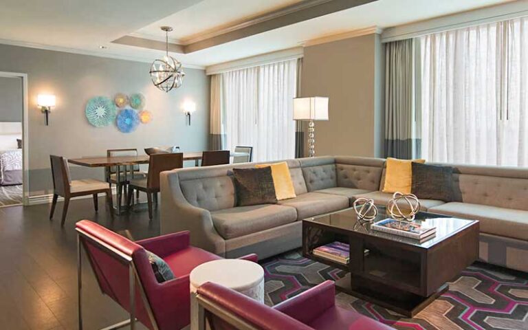 suite interior with living room furniture at renaissance tampa international plaza hotel