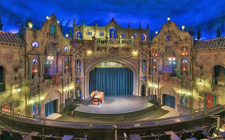 view from balcony of large open stage with organ at tampa theatre