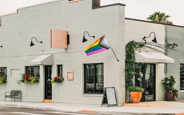 white brick exterior of building from street at willas and willas provisions tampa