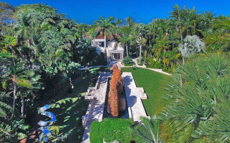 aerial view of brick and metal sculptures in front lawn of historic home at ann norton sculpture gardens west palm beach