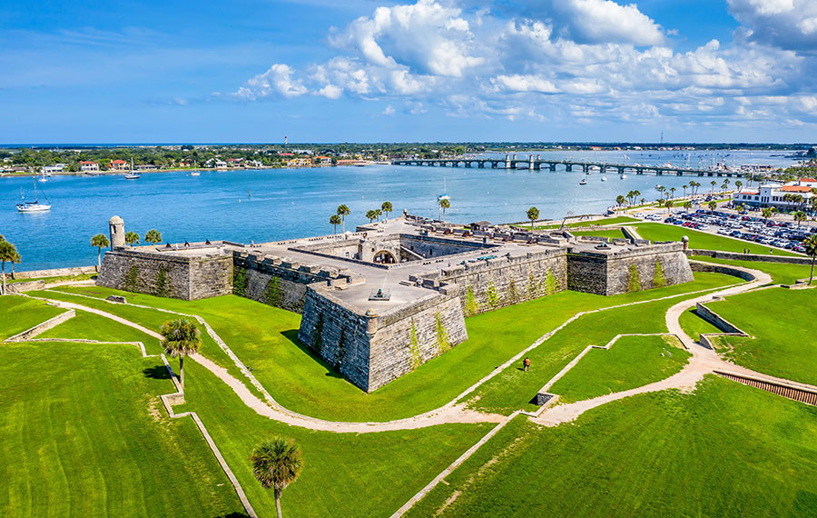 aerial view of castillo de san marcos and distant bridge of lions st augustine