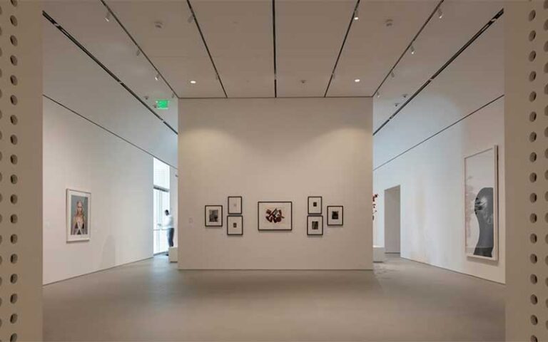 exhibit room with high ceilings and hung artwork at norton museum of art west palm beach