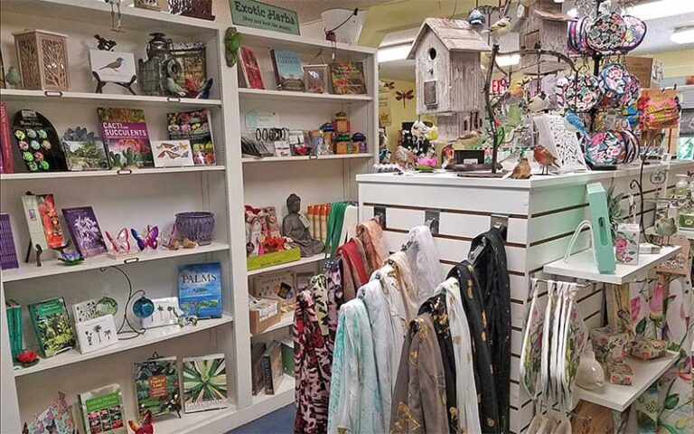 gift shop shelves with scarfs and books at mounts botanical garden west palm beach