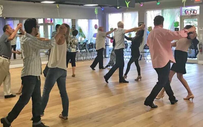 group of dancers in sync for class at caruso dancesport west palm beach