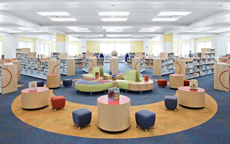 large childrens reading area with low shelves and seating at mandel public library of west palm beach