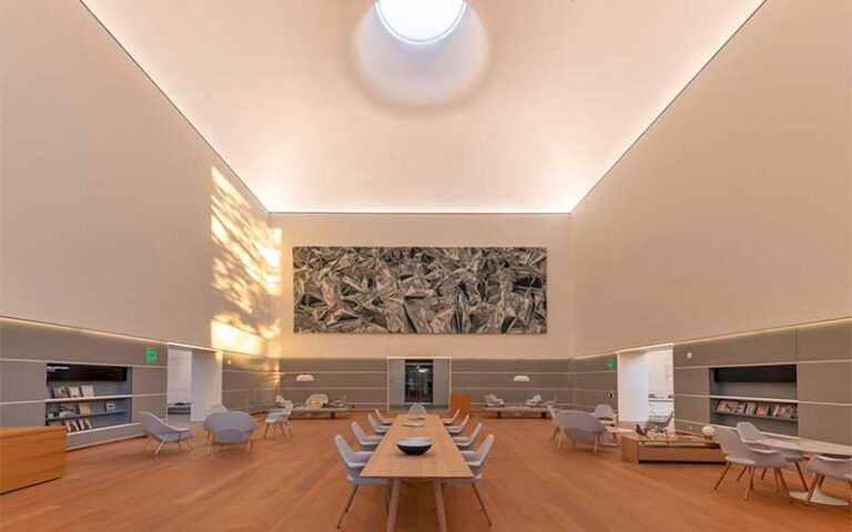 lounge area with round skylight and spaced out seating at norton museum of art west palm beach