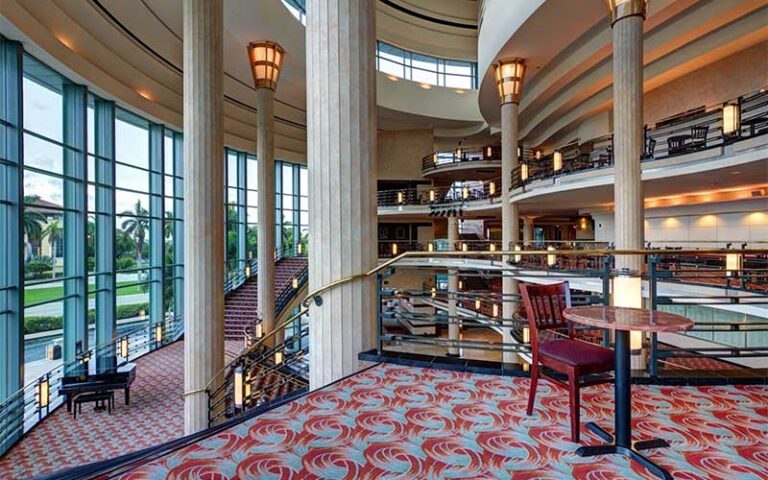 multi level carpeted lofts with columns windows and seating at kravis center for the performing arts west palm beach