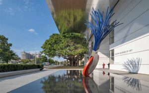 outside exterior with sculpture and tree along street at norton museum of art west palm beach