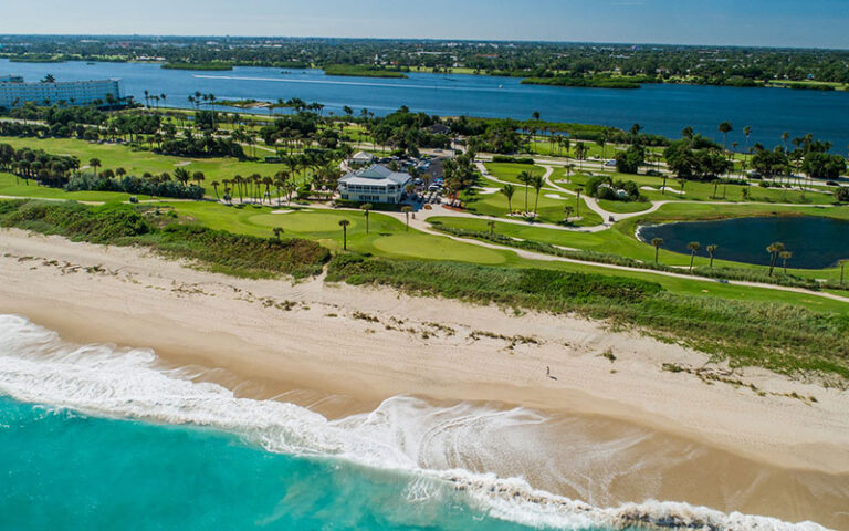 aerial view from over ocean of course and inlet at palm beach par 3 golf course