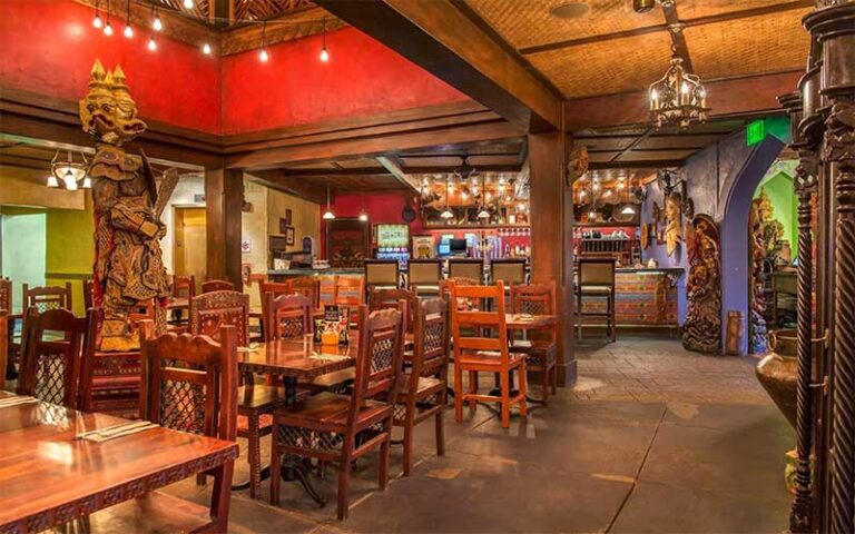 dining area with asian decor and bar at yak and yeti restaurant disney animal kingdom