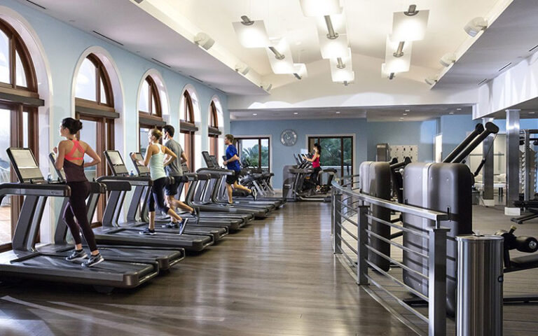 fitness center with cardio machines at the spa at the breakers palm beach