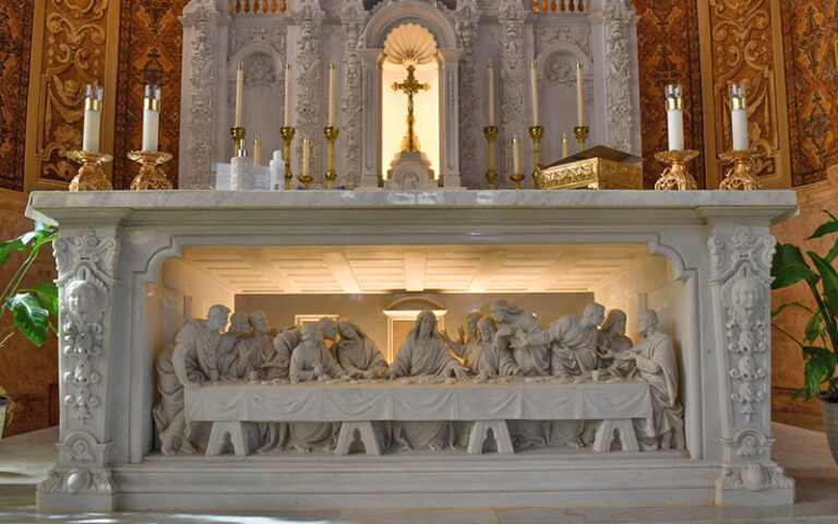 marble statue depicting lords supper altarpiece at st edward roman catholic church palm beach