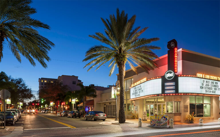 night view down clematis street with theater at palm beach dramaworks west palm beach