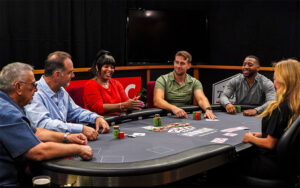poker table with various players at palm beach kennel club