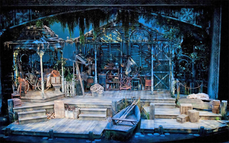 stage with intricate set design of garden house with boat at palm beach dramaworks west palm beach