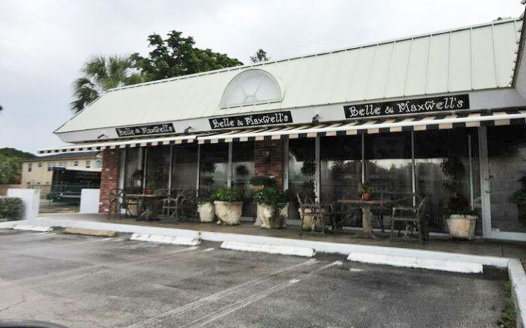 stand alone store with awnings at west palm beach antique row art design district