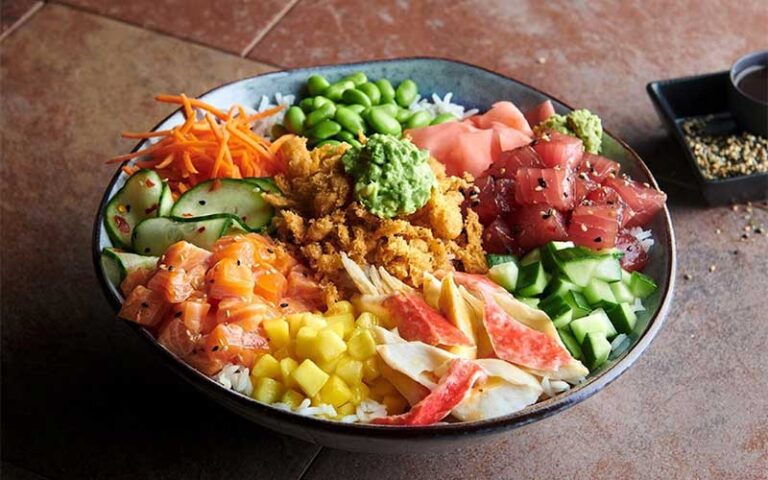 tuna poke bowl with colorful additions at yak and yeti restaurant disney animal kingdom