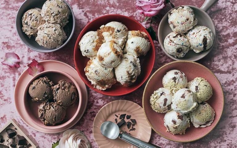 variety of ice cream scoops in bowls on tabletop at salt and straw cocowalk miami