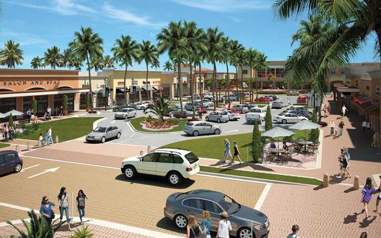 aerial view of shopping plaza with cars and people at delray marketplace palm beaches