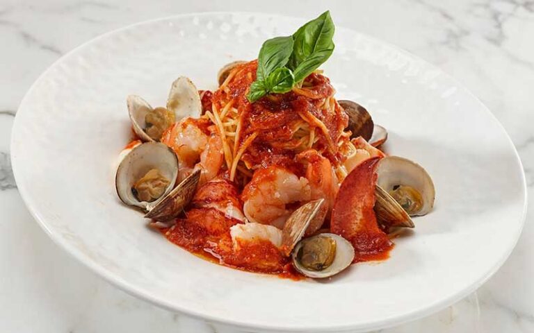 clam pasta with red sauce at seafood bar the breakers palm beach