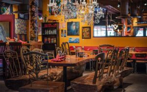 dining room with eclectic decor and chandeliers at cafe tu tu tango orlando