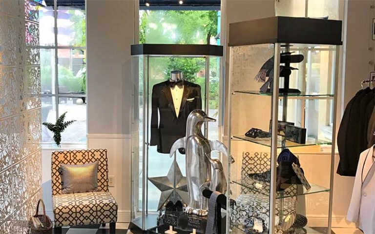 formalwear store interior with penguin statues at tux shop palm beach