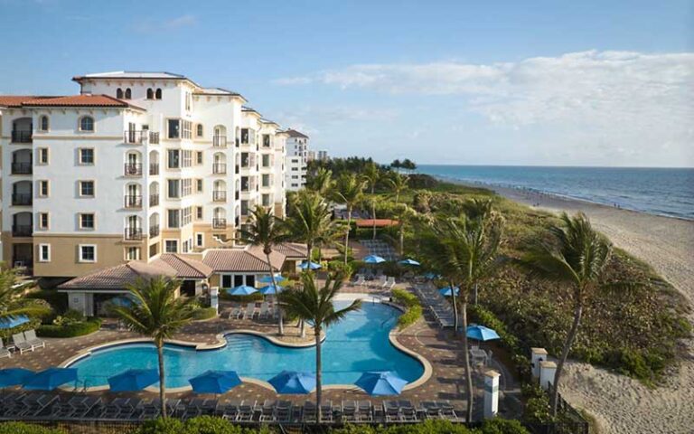 hotel with pool area along beach at marriotts ocean pointe palm beach shores