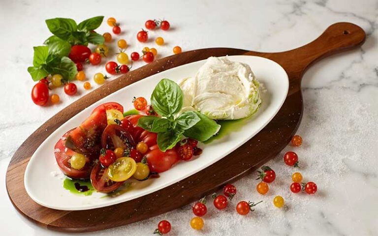 platter with mozzarella and tomatoes at the italian restaurant the breakers palm beach