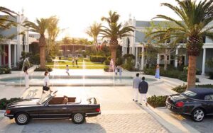 plaza with fountains shoppers and drop off lane at the royal poinciana plaza palm beach