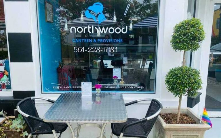 sidewalk cafe table and shop window at northwood village west palm beach