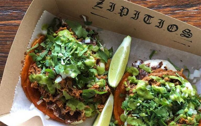 street style tacos with cilantro in tray on tabletop at grandview public market west palm beach