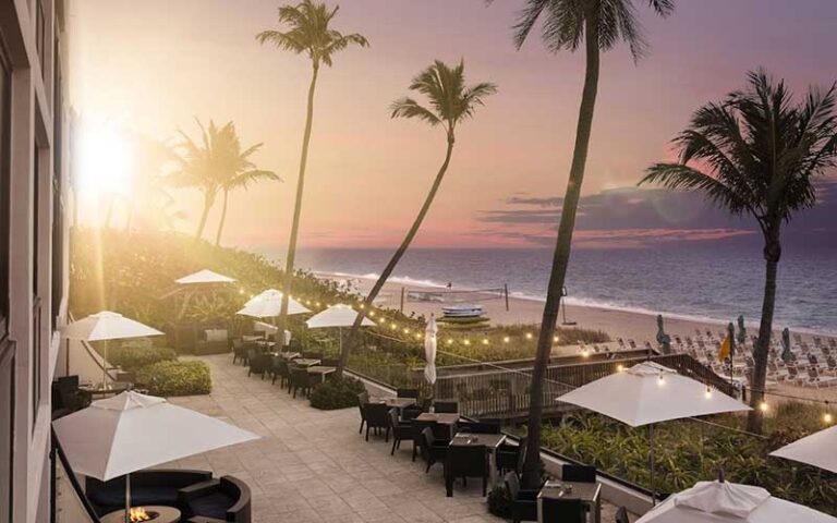 sunset view terrace dining on beach at tideline palm beach ocean resort spa