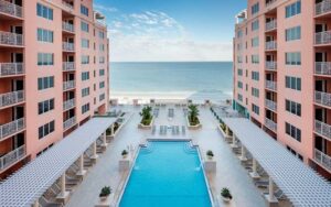 aerial view of hotel with courtyard pool framing beach at hyatt regency clearwater beach resort and spa