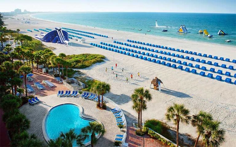 aerial view of pool and beach with slides and activities at island grand resort st pete beach