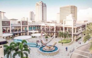 aerial view of shopping center with courtyard and stores at the sundial st pete