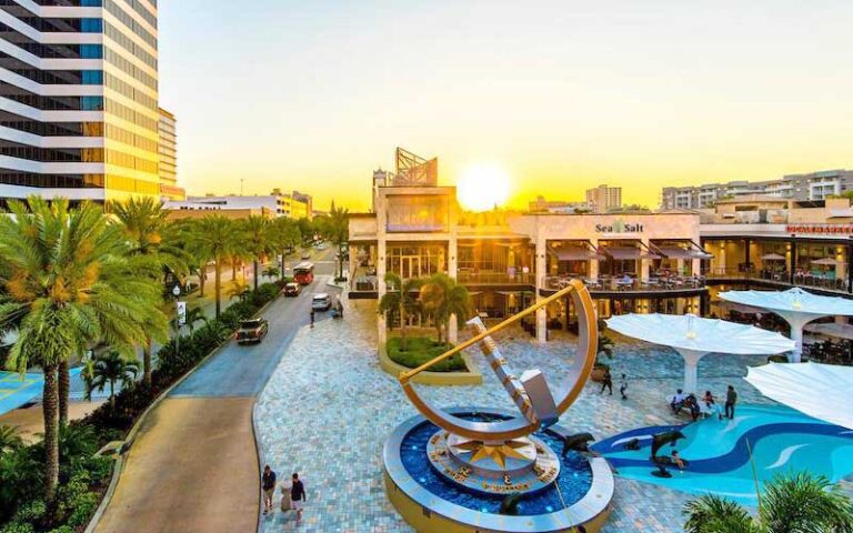 aerial view of shopping center with fountain sculpture and sunset at the sundial st pete