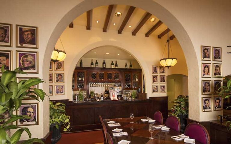 arched dining area with caricatures at the brown derby at hollywood studios walt disney world resort orlando