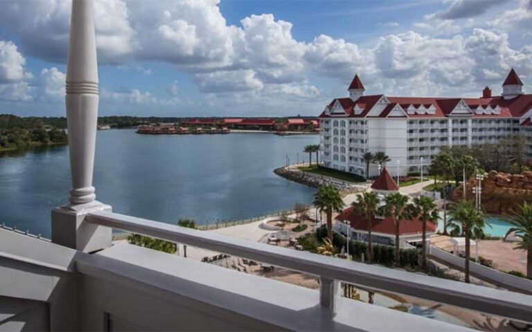 balcony view of lake and pool at disneys grand floridian resort spa walt disney world orlando