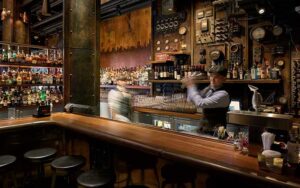 bar with tenders in period dress at the edison at disney springs orlando