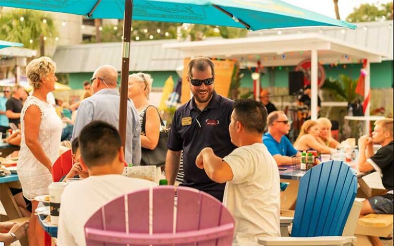 colorful outdoor dining seating at the original crabby bills indian rocks beach