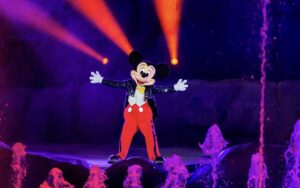 costumed character mickey directing water fountain effects at fantasmic at hollywood studios walt disney world resort orlando