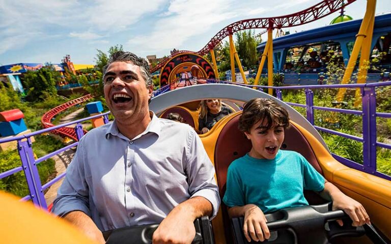 dad and son on coaster on slinky dog dash at hollywood studios walt disney world resort orlando