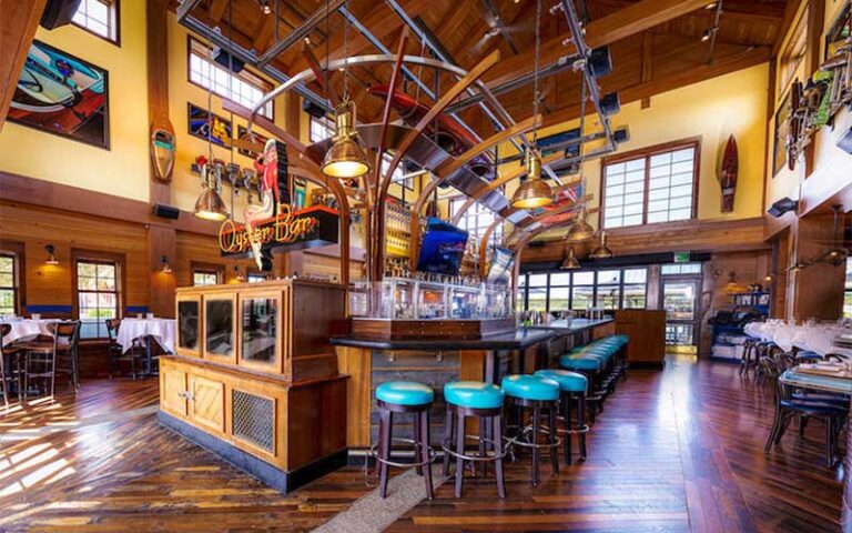 dining area with oyster bar and boat decor at the boathouse at disney springs orlando