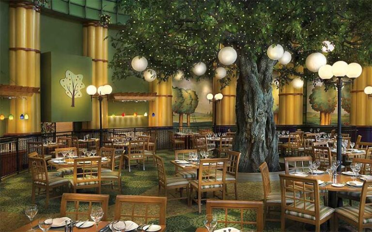 dining area with tree installation at walt disney world swan resort orlando