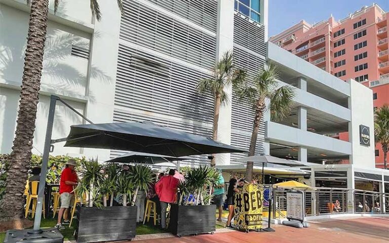 dining patio at base of resort building at badfins food drink clearwater beach
