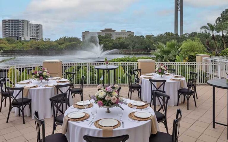 dining patio overlooking fountain in lake at hilton st petersburg carillon park