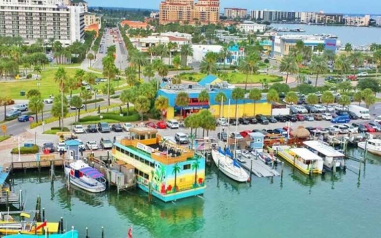 dock with cruise ship and buildings at calypso queen clearwater